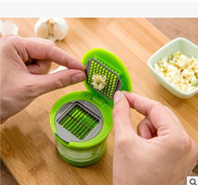 Load image into Gallery viewer, Press garlic chopper on both sides for home convenience
