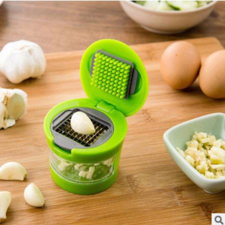 Press garlic chopper on both sides for home convenience